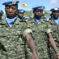 United Nations Guard Unit soldiers matching during the Inauguration of the United Nations Guard Unit in Somalia, 2014. Image credit David Mutua for AU UN IST Photo, public domain via Flickr.
