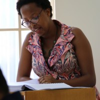 Candidate Haydee Bangerezako delivers her presentation
